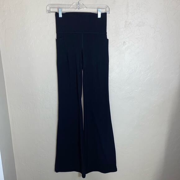 Athleta salutation stash pocket flare leggings - Picture 1 of 6